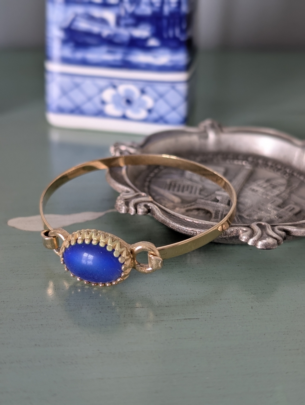 Gold-Tone Bracelet with Blue Cabochon Stone